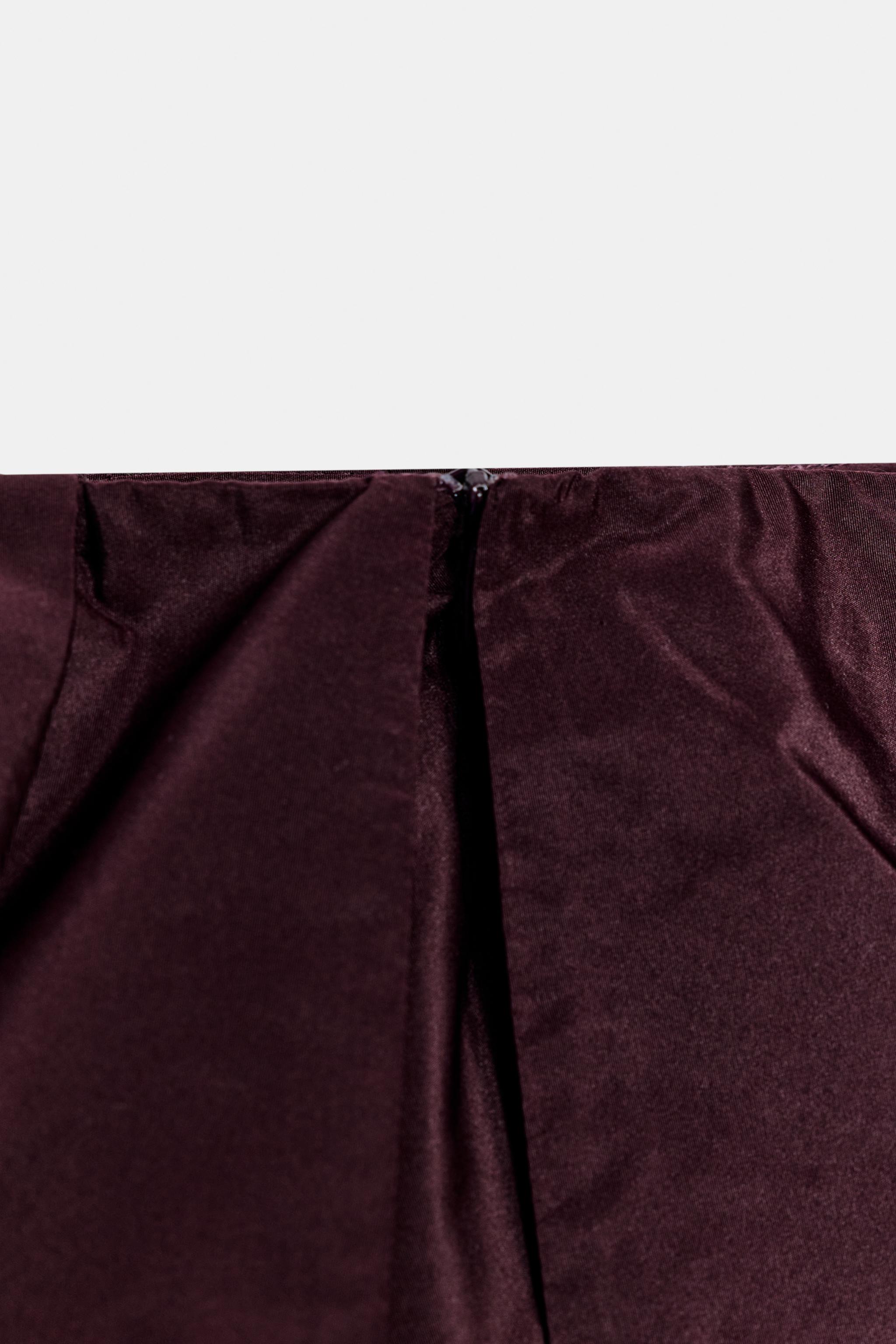 VOLUMINOUS MIDI SKIRT